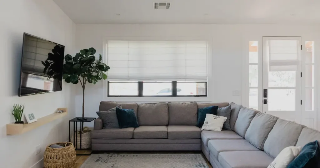 Elegant luxury living room with modern decor, plush seating, and ambient lighting