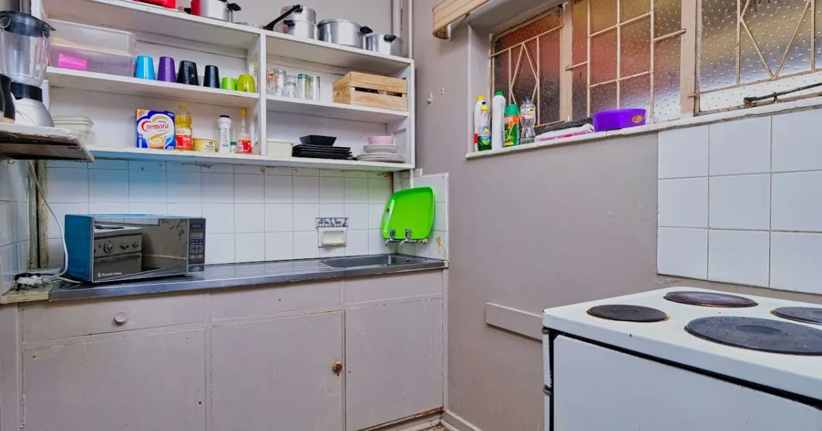 Spacious kitchen counter with only essential items to avoid overcrowding